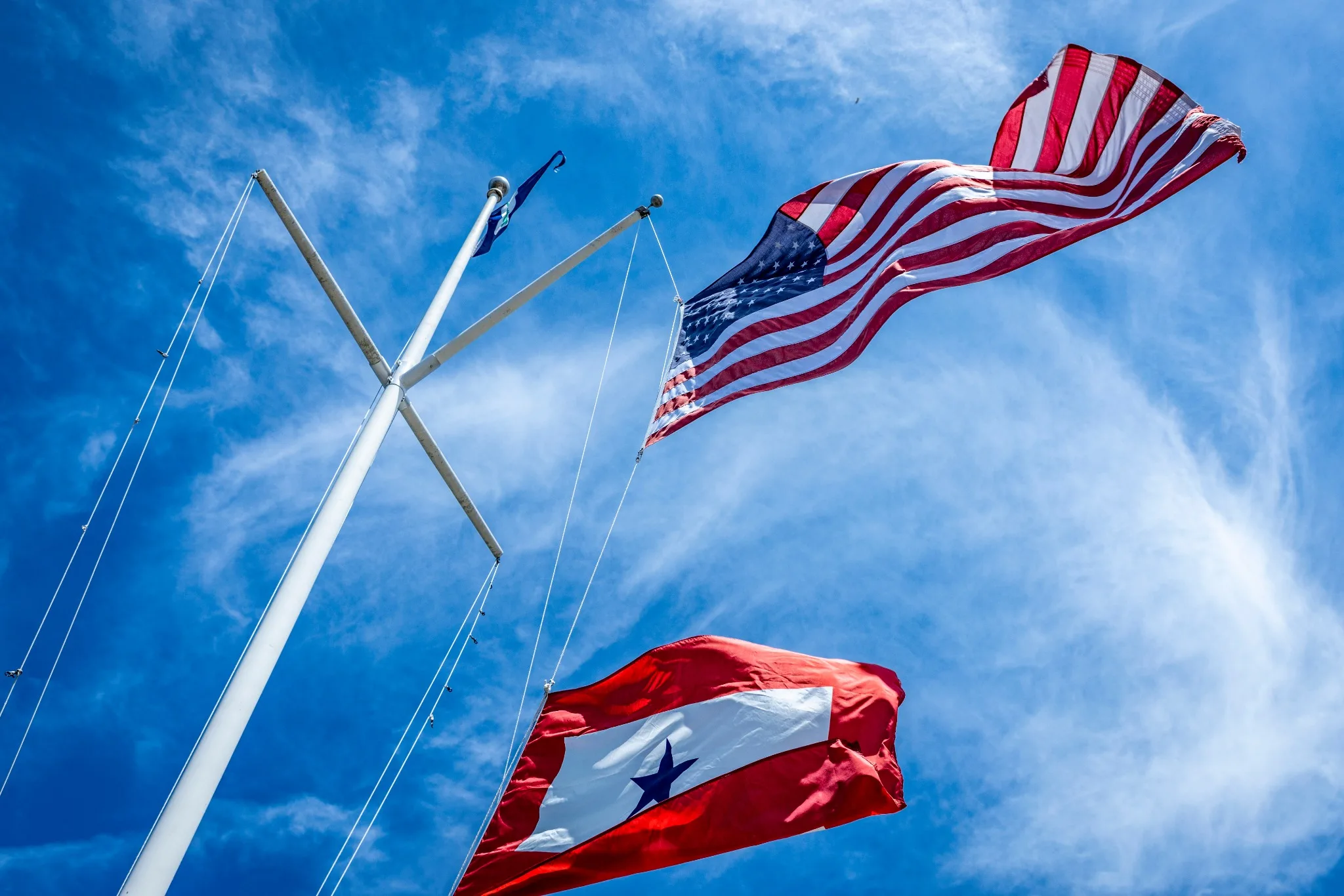 American flags and water spray during July Fourth festivities