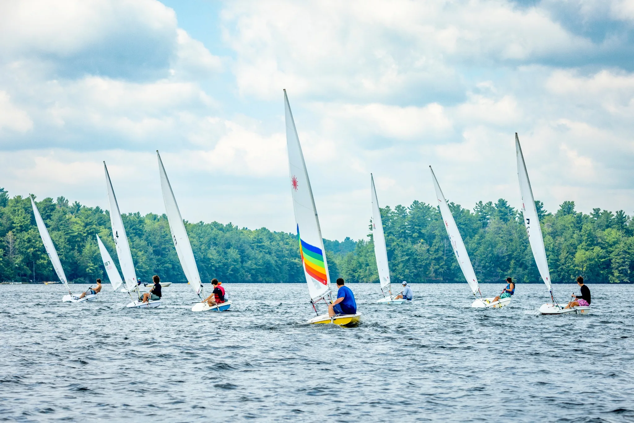 Fleet of sailboats racing on Lake Naomi
