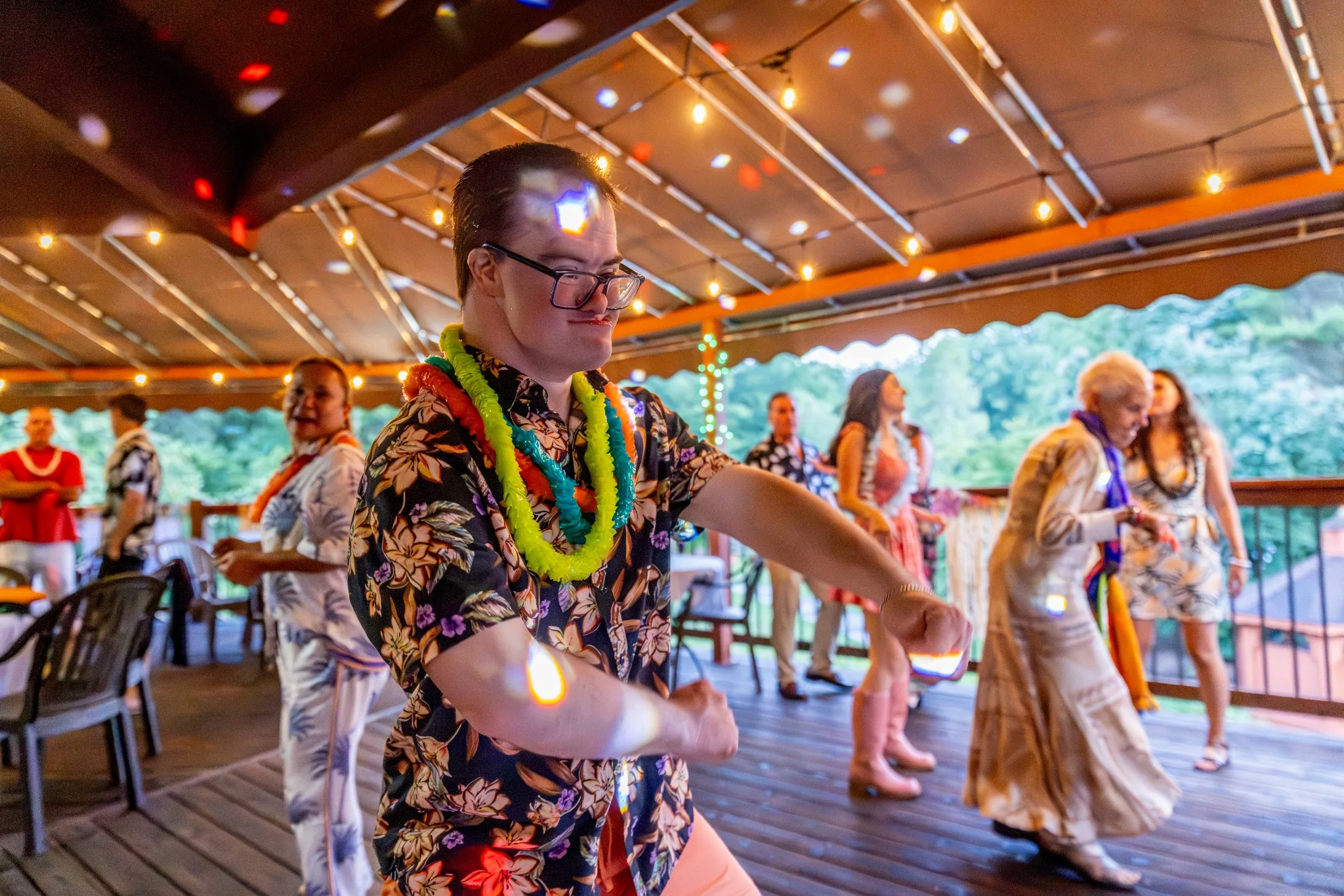 Colorful dancing during the Lake Naomi luau
